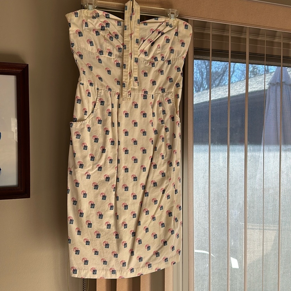 Girls from Savoy (Anthropologie) strapless or halter dress with pockets.